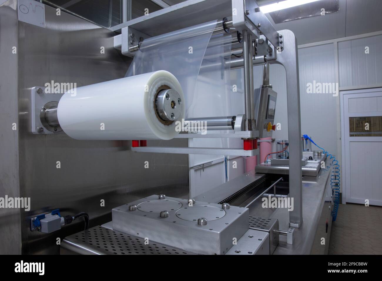 Transformation de l'emballage du beurre et du fromage sur une machine à