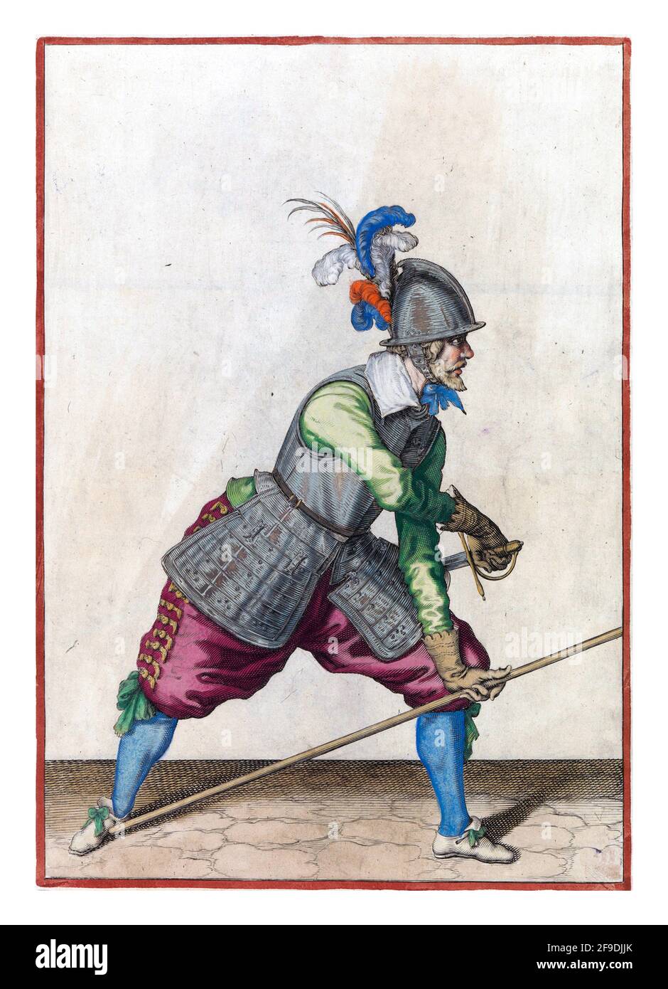 Un soldat, de pleine longueur à droite, plaçant sa lance avec sa main gauche contre son pied droit et tirant son épée avec sa main droite Banque D'Images