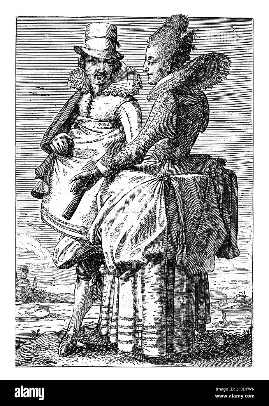 Un homme et une femme en vêtements du début du XVIIe siècle. La femme tient un ventilateur. En arrière-plan une rivière avec un bateau à voile. Banque D'Images