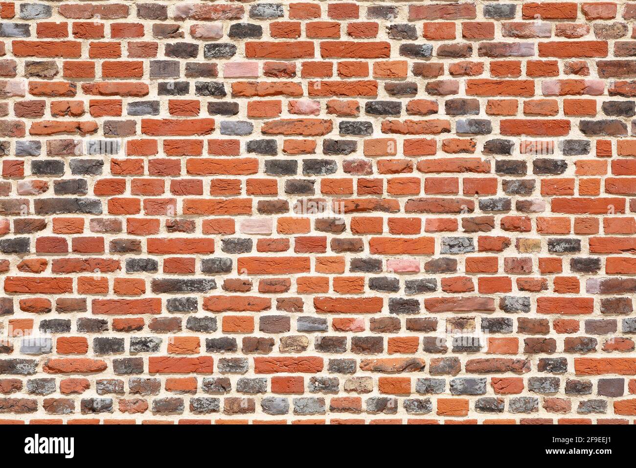 Motif losanges noirs en briques décoratives. Mur de briques vintage, Royaume-Uni Banque D'Images