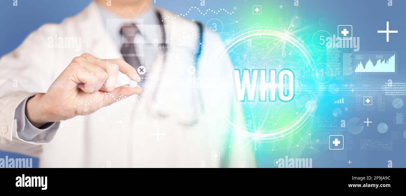 Gros plan d’un médecin vous donnant une pilule Banque D'Images