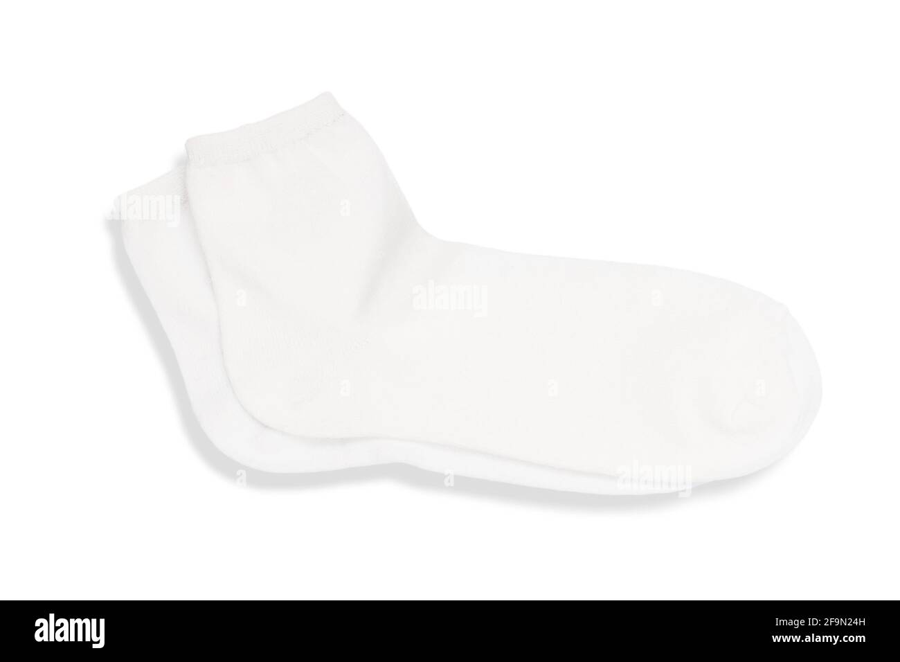 Paire de chaussettes blanches sur un fond bleu, vue du dessus. Banque D'Images