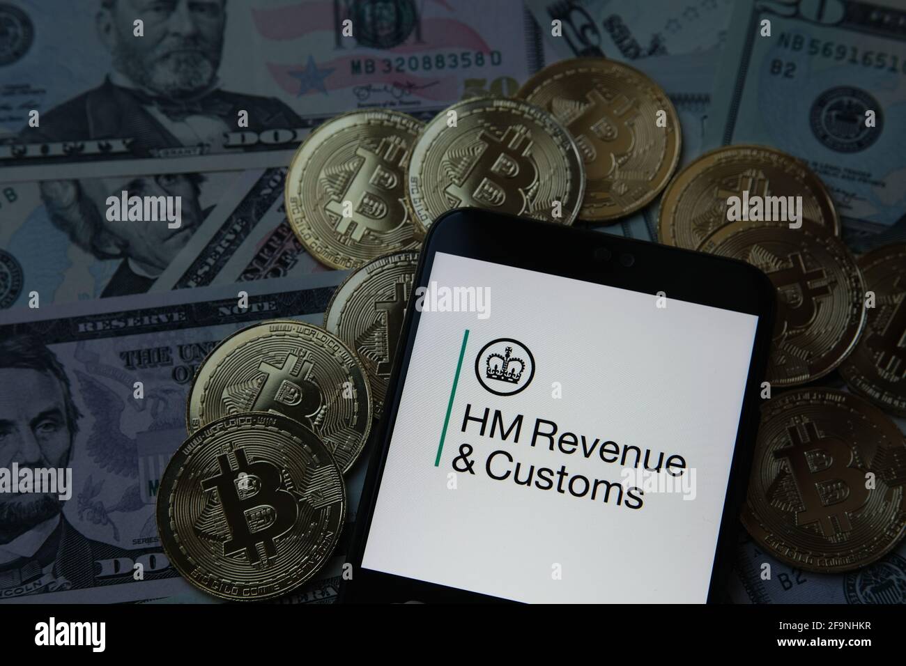 HMRC HM revenus et douanes. Bitcoins et dollars. Banque D'Images