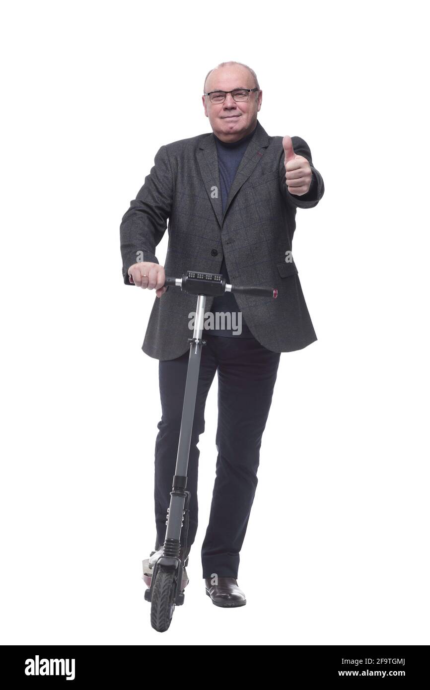 pleine croissance . Homme d'affaires mature avec un scooter électrique Banque D'Images