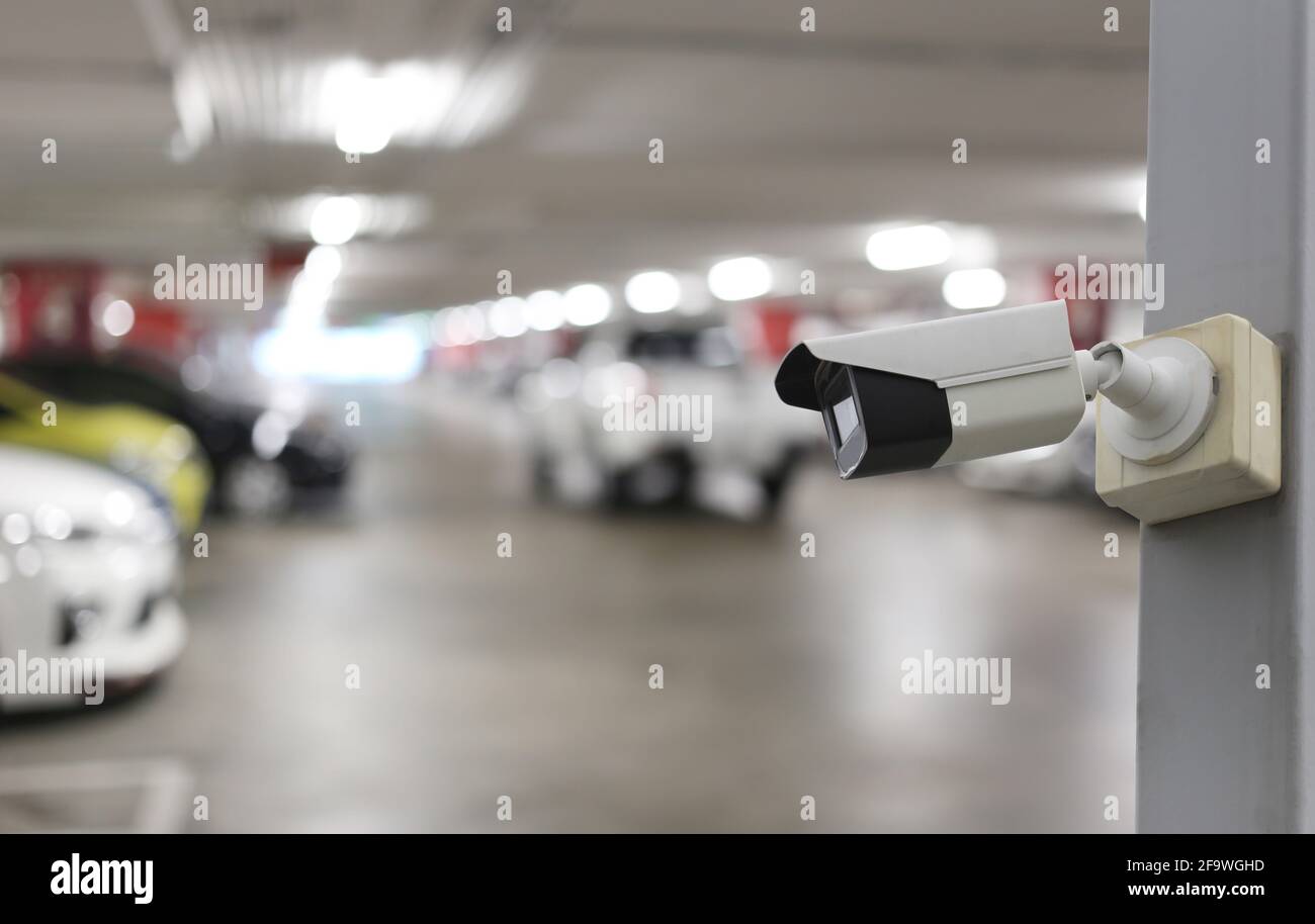 Outil CCTV sur fond de parking de voiture, équipement pour les systèmes de sécurité et ont un espace de copie pour la conception. Banque D'Images
