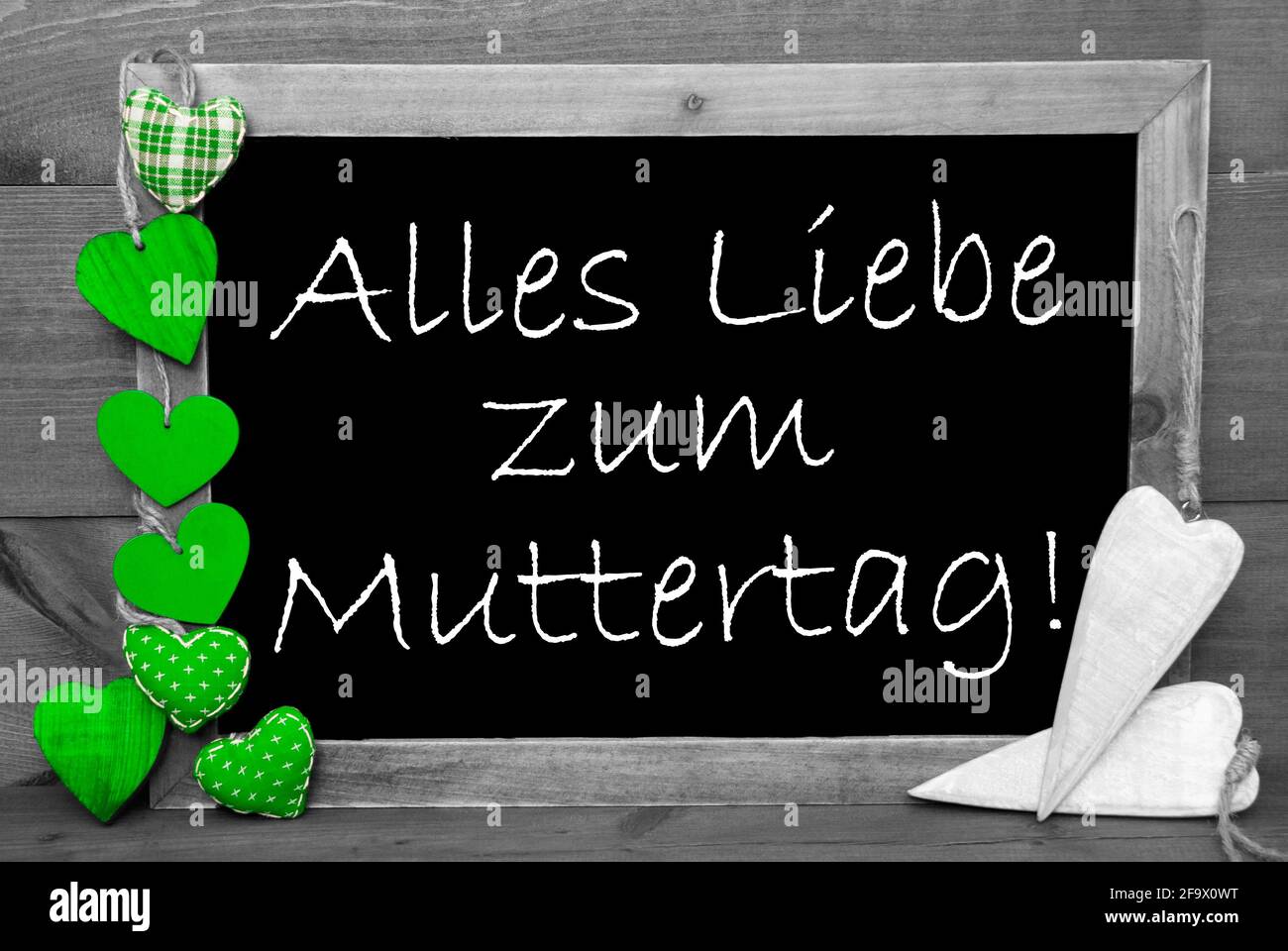Balckboard avec texte allemand Alles Liebe Zum Muttertag signifie Happy  Mothers Day. Arrière-plan en bois gris avec coeur bleu de couleur  décorative Photo Stock - Alamy