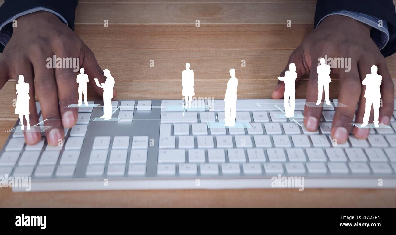 Composition de silhouettes blanches sur l'homme à l'aide d'un clavier d'ordinateur Banque D'Images
