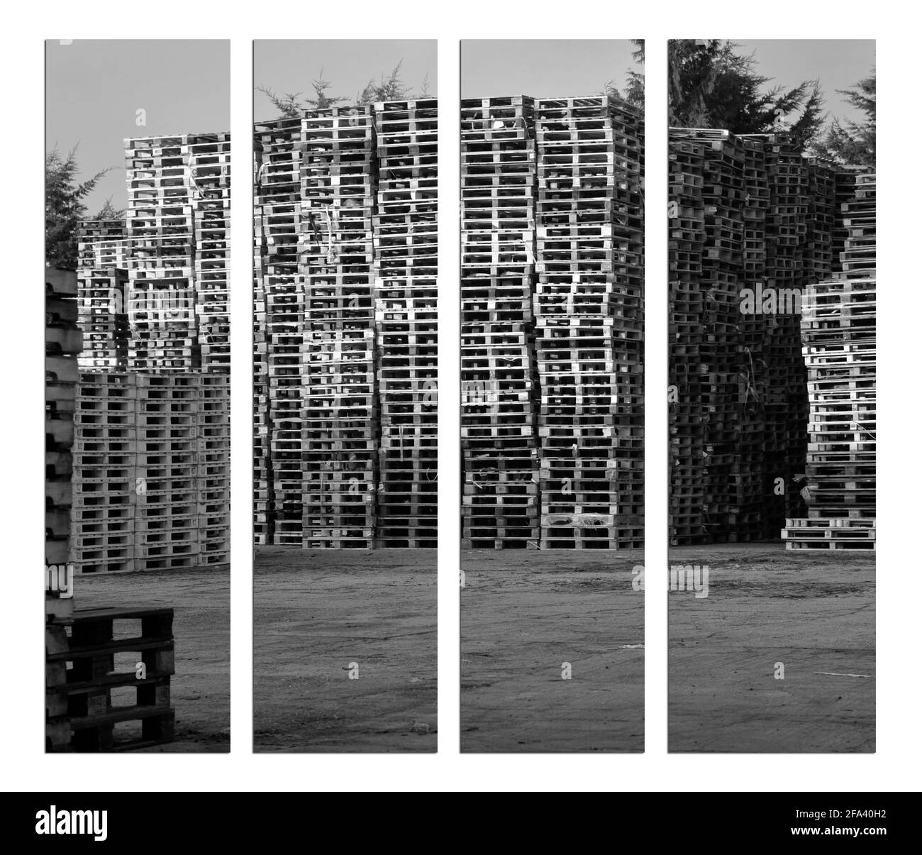 pile de palettes de transport en bois stockées Banque D'Images