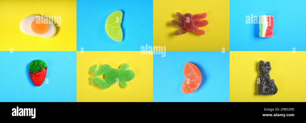 mosaïque d'un groupe de bonbons gélifiés jaune et bleu arrière-plan Banque D'Images
