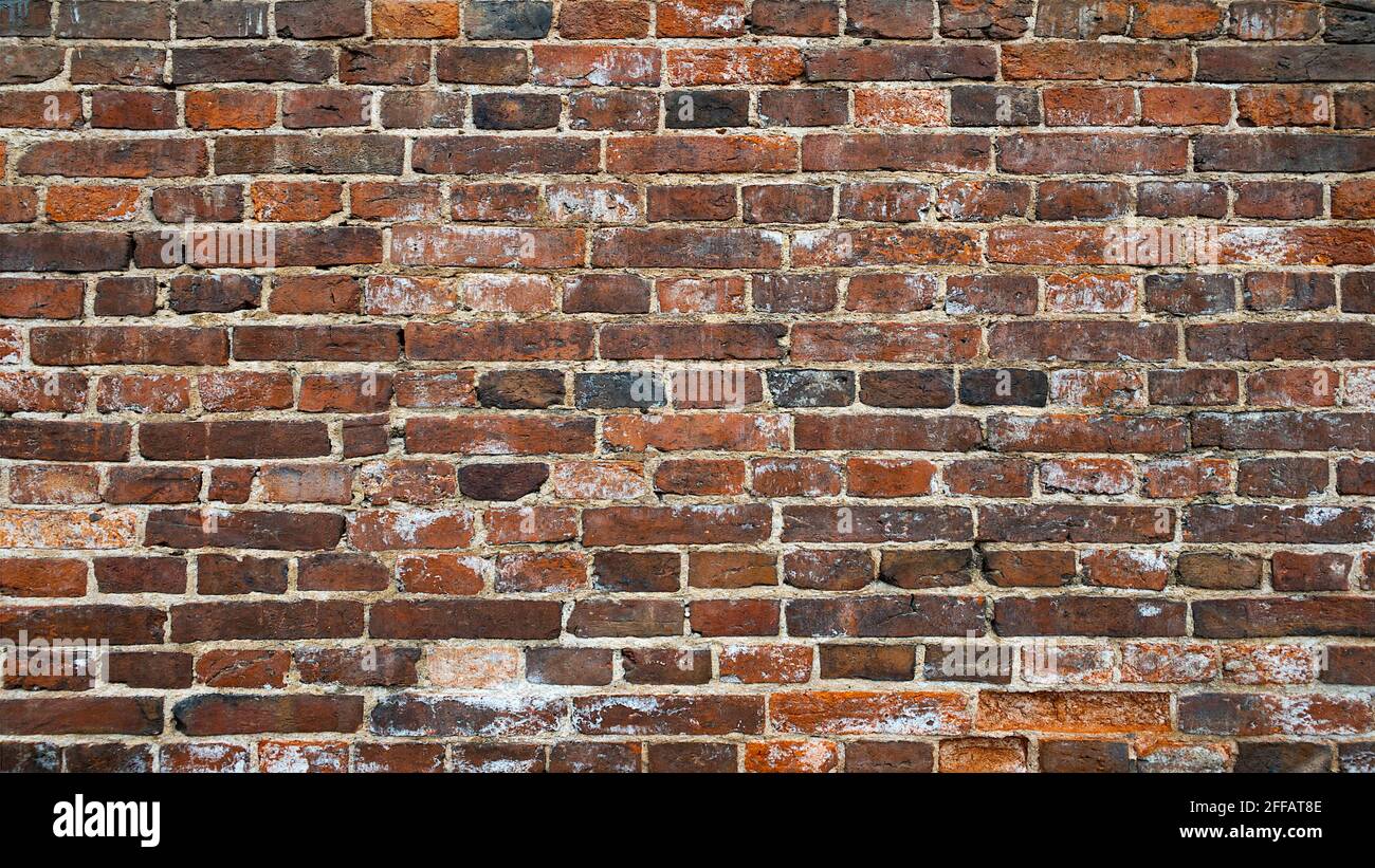 Fond de mur de brique rouge, texture de mur de brique rouge grunge fond avec des coins détexturés à la conception intérieure Banque D'Images
