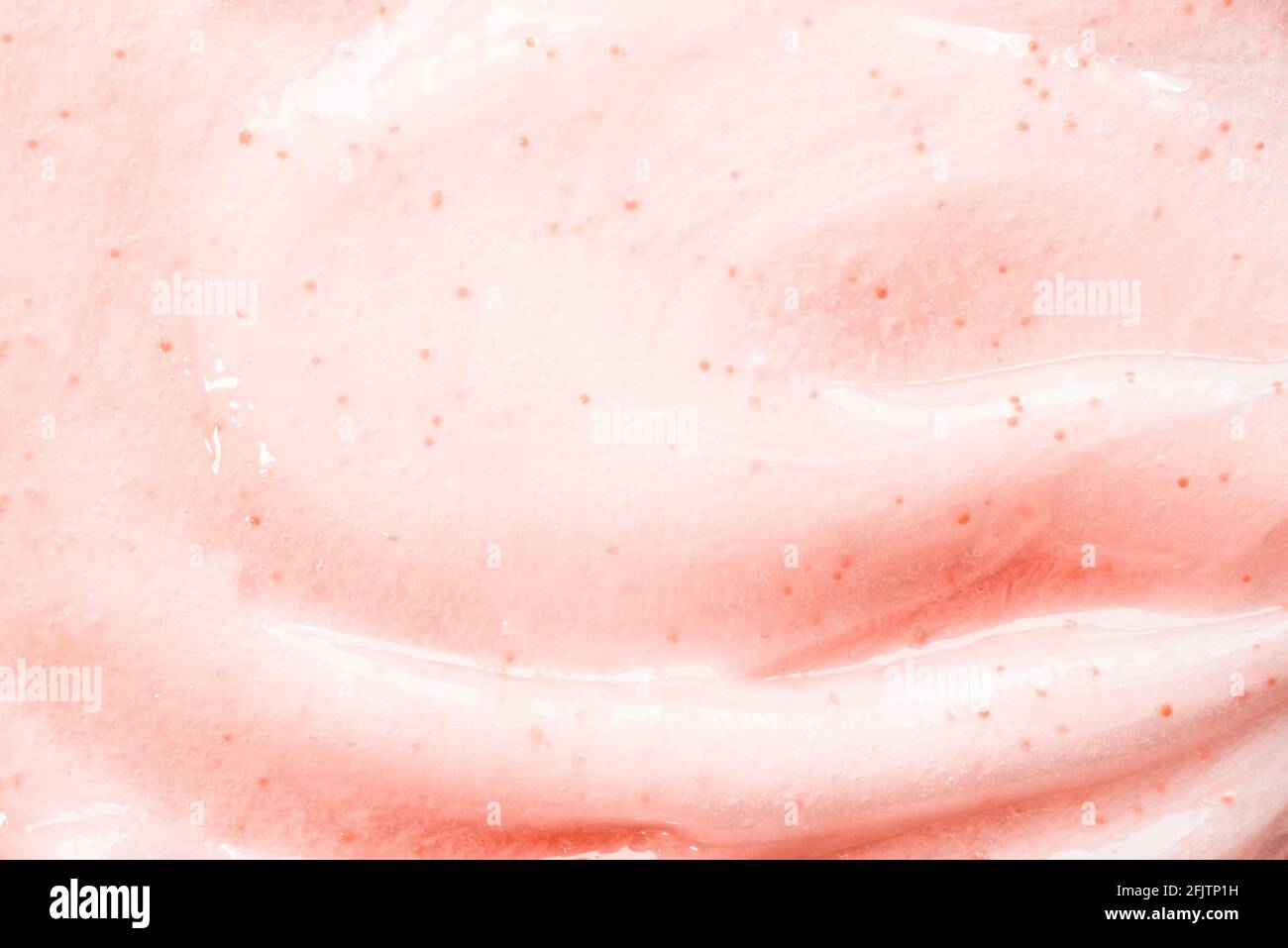 Texture d'un gel douche ou d'un gommage sur fond rose Photo Stock - Alamy