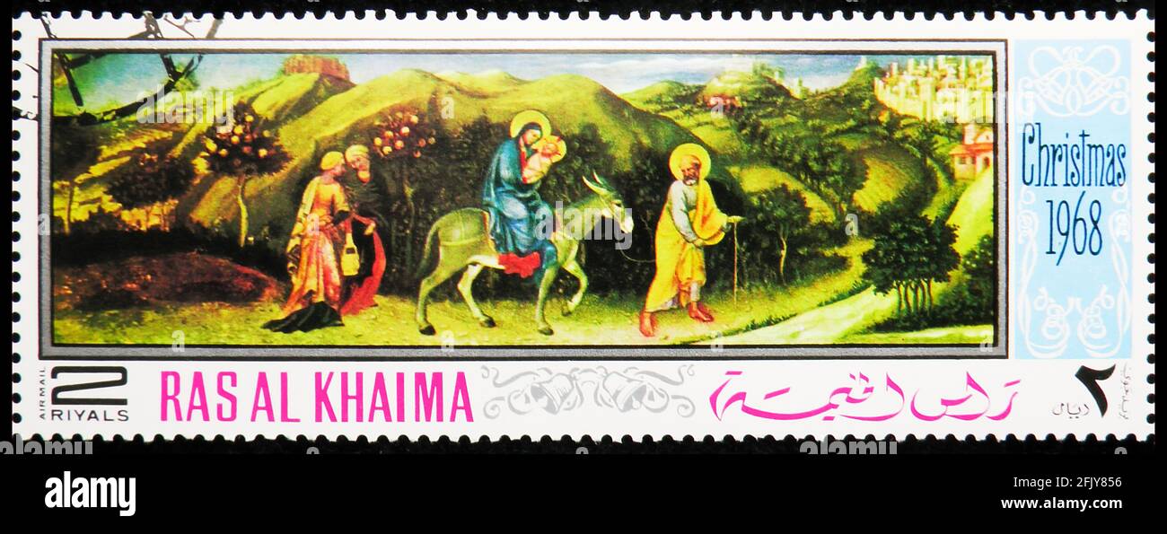 MOSCOU, RUSSIE - 16 NOVEMBRE 2019 : le timbre-poste imprimé à Ras Al Khaimah (Émirats arabes Unis) montre un vol en Égypte; par Gentile da Fabriano (13 Banque D'Images