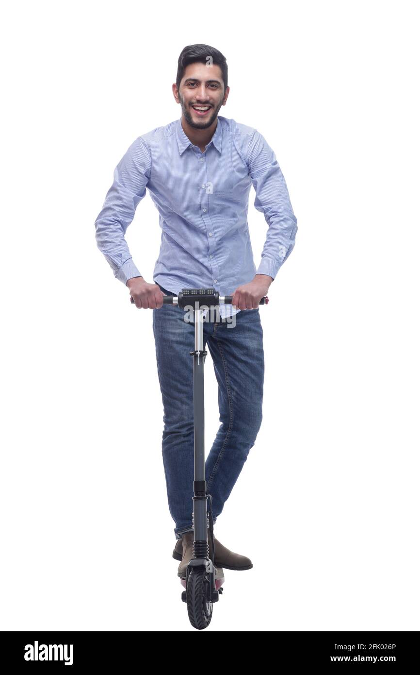 en pleine croissance. jeune homme heureux avec un scooter électrique Banque D'Images