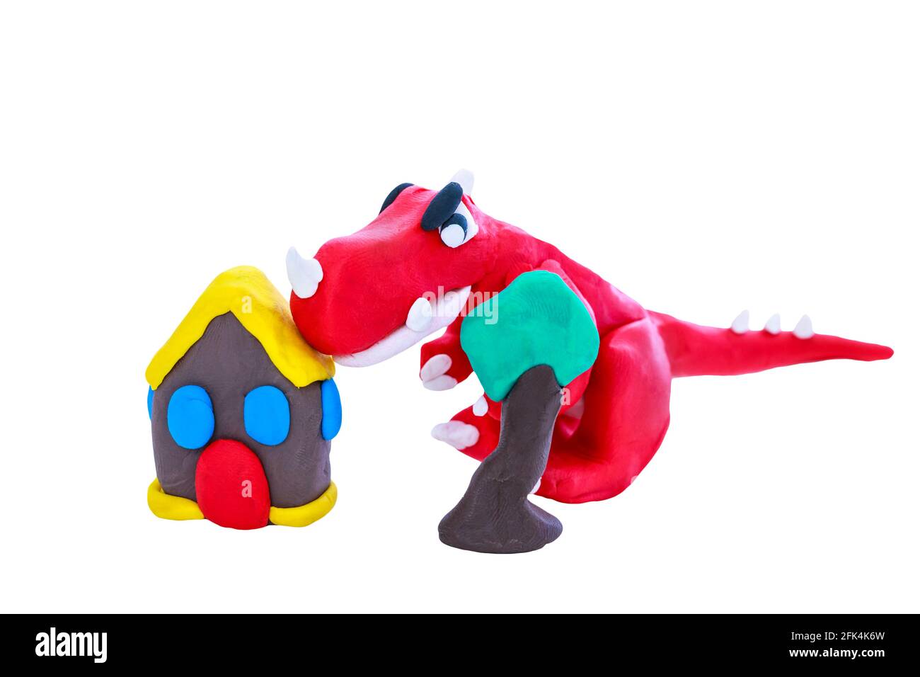 Modèle en argile créatif. Dinosaure rouge, maison et arbre d'enfants plasticité lumineuse, isolé sur fond blanc. Jouer à l'animal de la pâte Banque D'Images