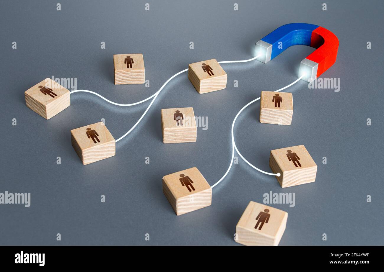 L'aimant attire des aimants pour certaines personnes. Embauche de personnel hautement qualifié. Trouver le meilleur candidat. Ressources humaines. Banque D'Images