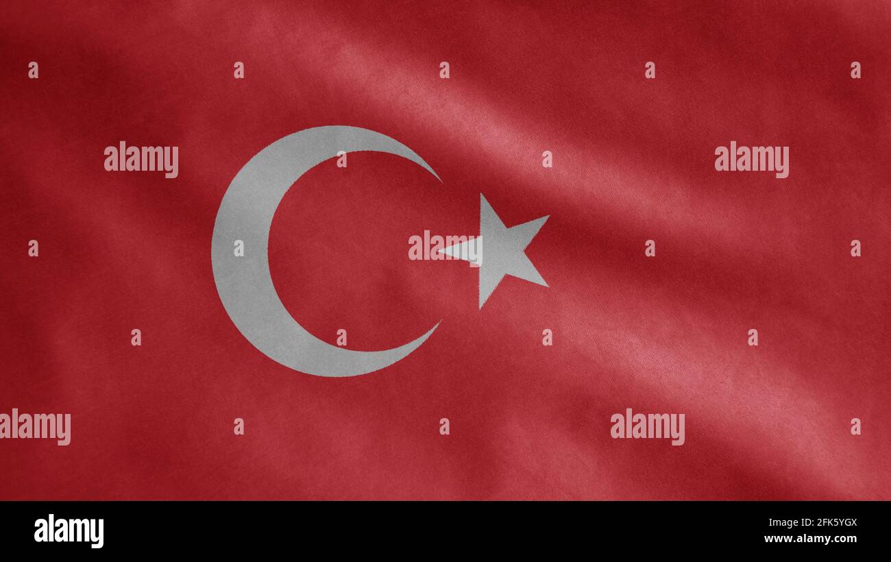 Drapeau turc agitant dans le vent. Gros plan de la bannière de dinde soufflant, doux et lisse soie. Tissu texture ensign arrière-plan. Utilisez-le à l'échelle nationale Banque D'Images
