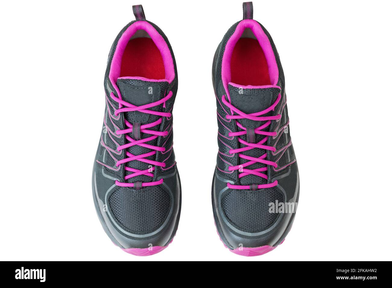 Vue de dessus de chaussures de randonnée légères chaussures pour femmes en noir et rose, isolées sur fond blanc Banque D'Images