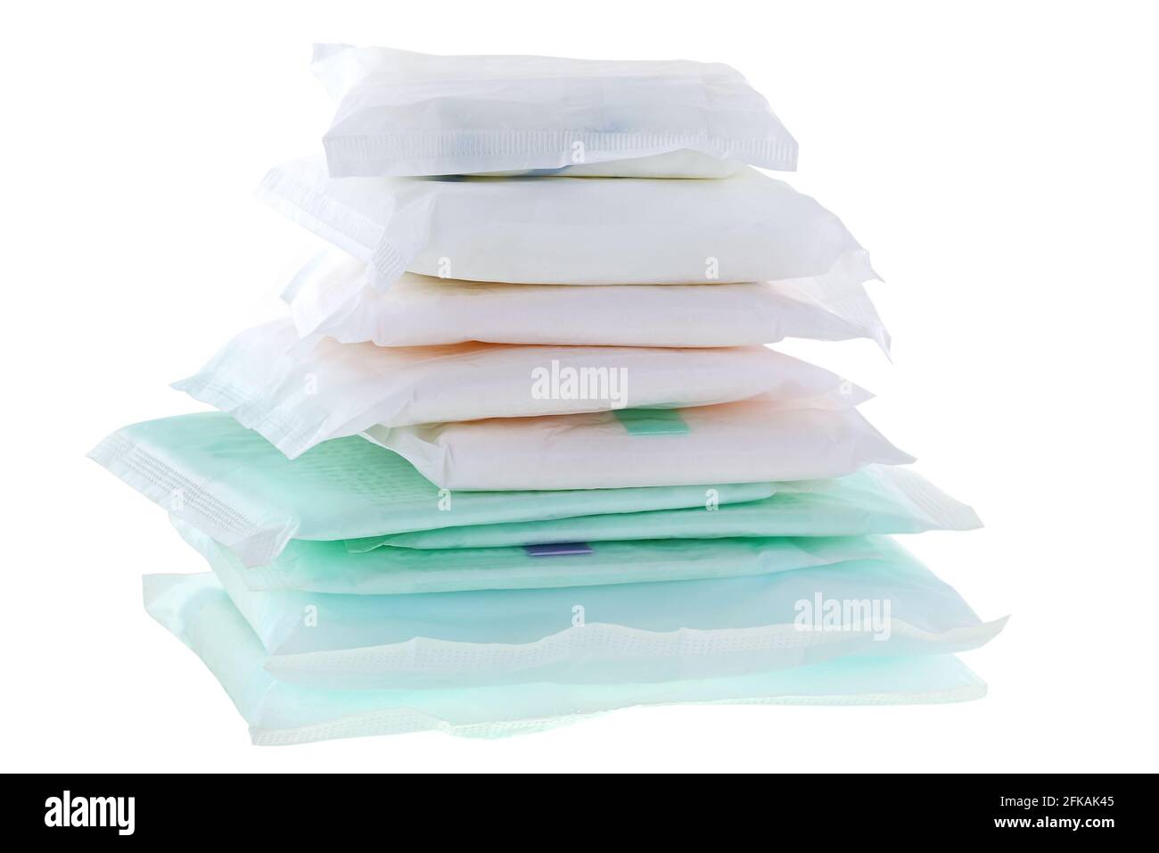 Pile de différents types et tailles de serviettes sanitaires (serviette sanitaire, bloc sanitaire, bloc menstruel) isolées sur blanc Banque D'Images