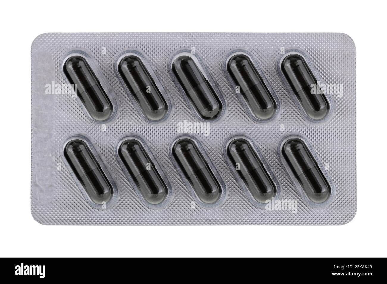 Un paquet plein de capsules noires avec charbon actif poudre (carbone) à l'intérieur, isolé sur blanc Banque D'Images