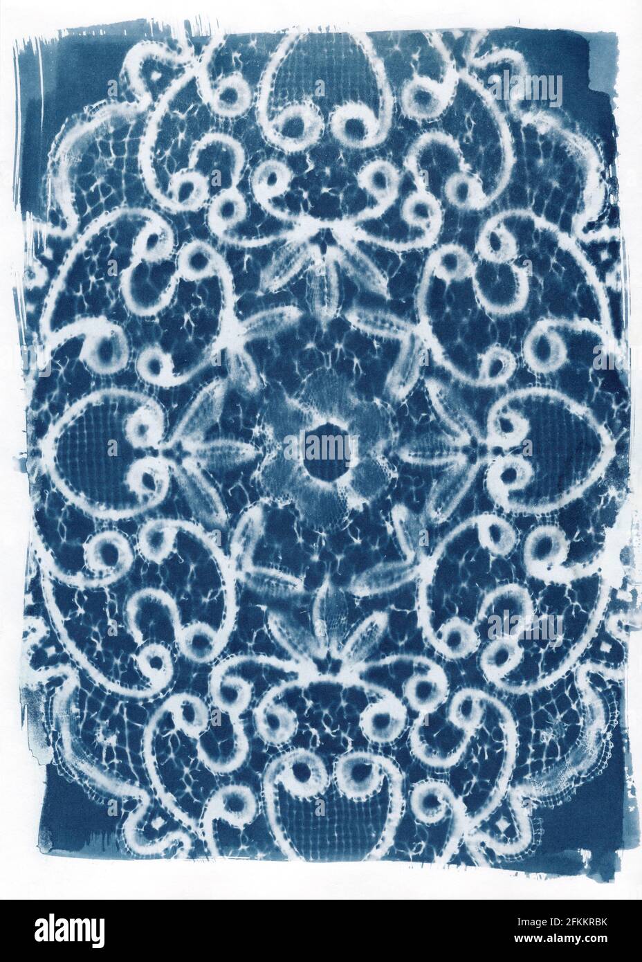 Le cyanotype moderne imprime des images à l'aide de dentelle dolily Banque D'Images