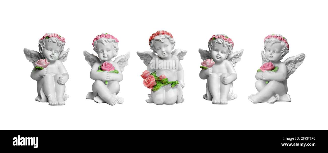 Figurines Angel isolées sur fond blanc Banque D'Images