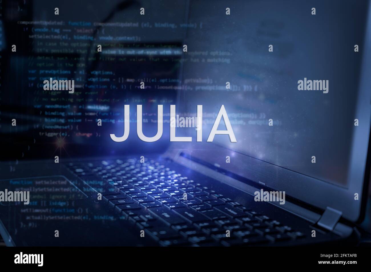 Inscription Julia sur l'ordinateur portable et le fond du code. Concept de technologie. Apprendre le langage de programmation. Banque D'Images
