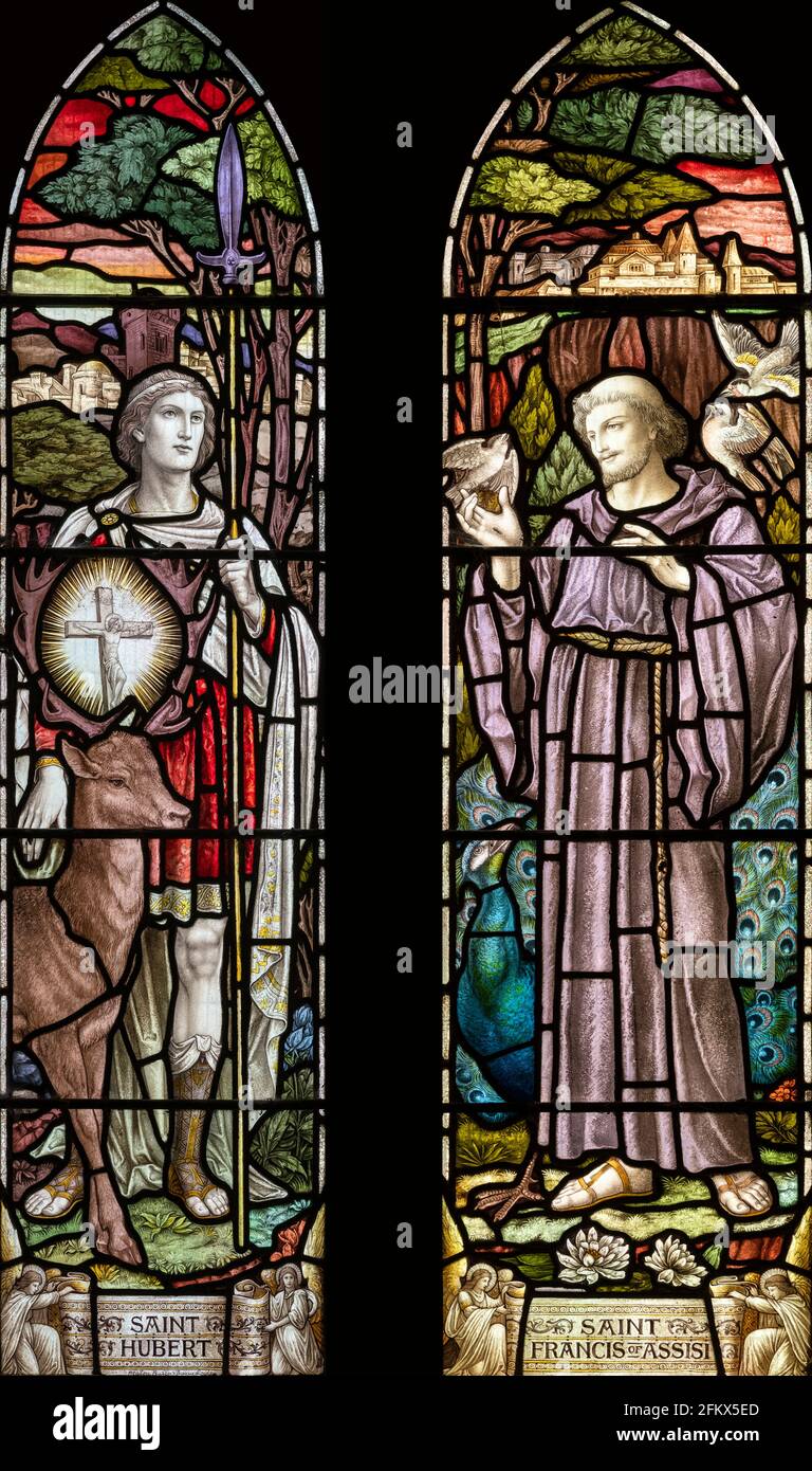 Saints patrons de chasseurs et d'écologie représentés par Heaton, Butler et Bayne dans All Saints Church, Moor Monkton, North Yorkshire, Royaume-Uni Banque D'Images