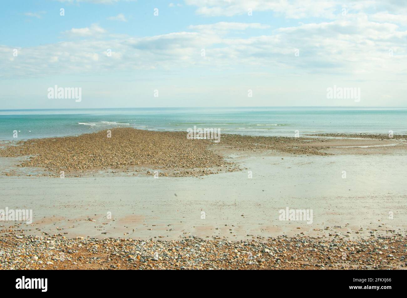 Se mêlent à marée basse, East Beach, Littlehampton, West Sussex, Royaume-Uni Banque D'Images