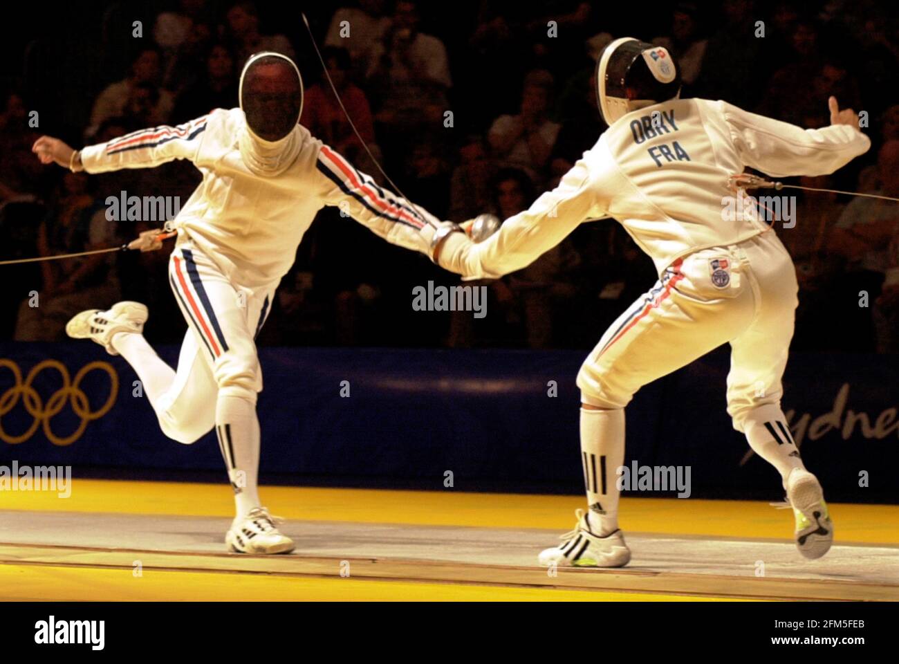 Jeux Olympiques de Sydney septembre 2000 équipe de hommes Epee demi-finale France v Cuba Hughes Obry / Carlos Pedroso Banque D'Images