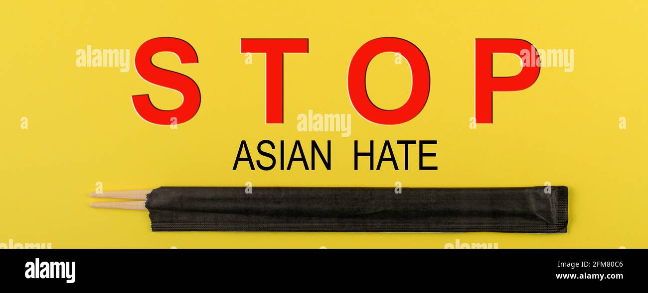 Arrêter le concept de haine asiatique. Bannière avec des baguettes et des mots empêchent la haine asiatique Banque D'Images