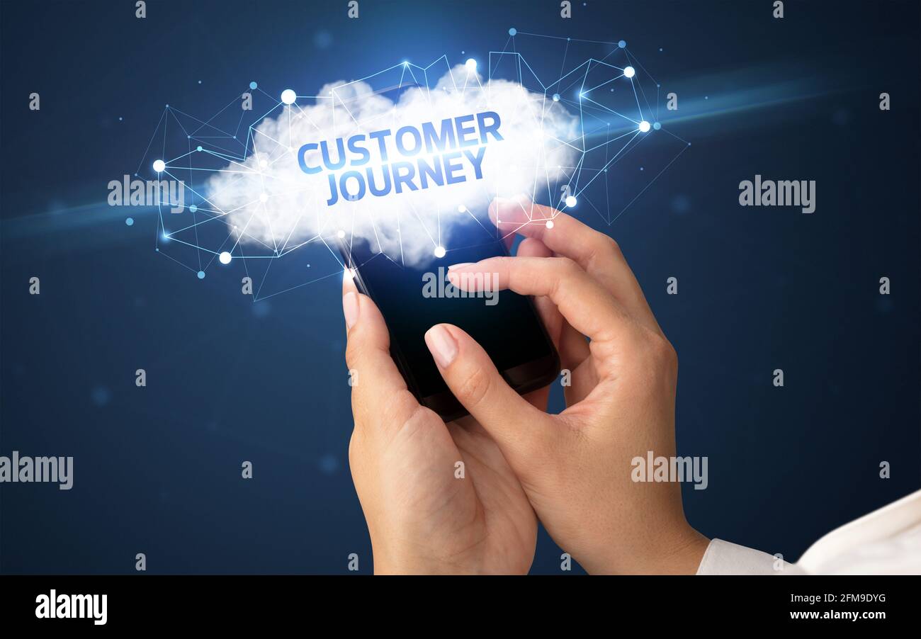 Utilisation manuelle d'un smartphone avec le concept d'entreprise cloud Banque D'Images