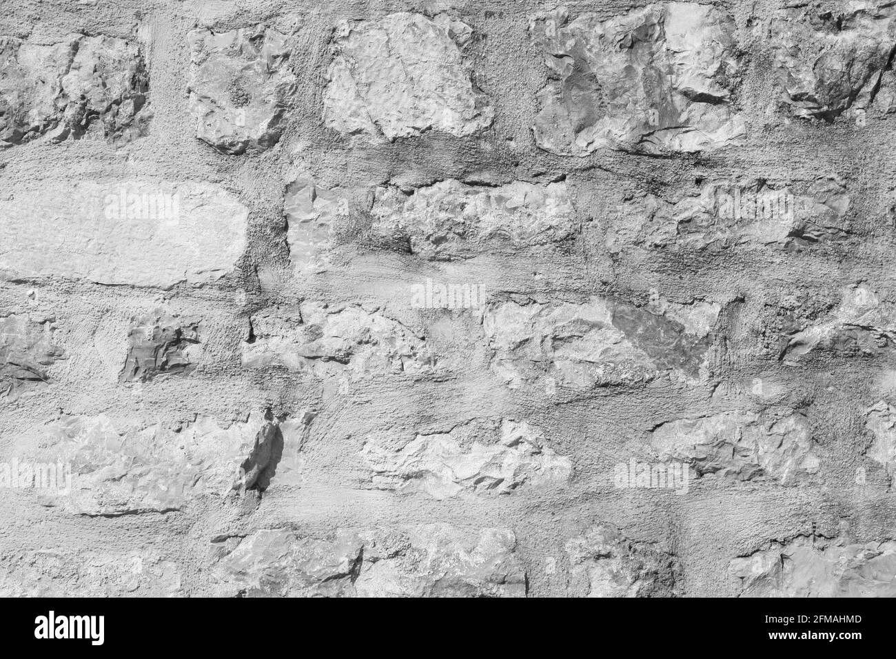 Gros plan sur le château de mur en pierre. C'est un mur rugueux en pierre pour le motif et l'arrière-plan Banque D'Images