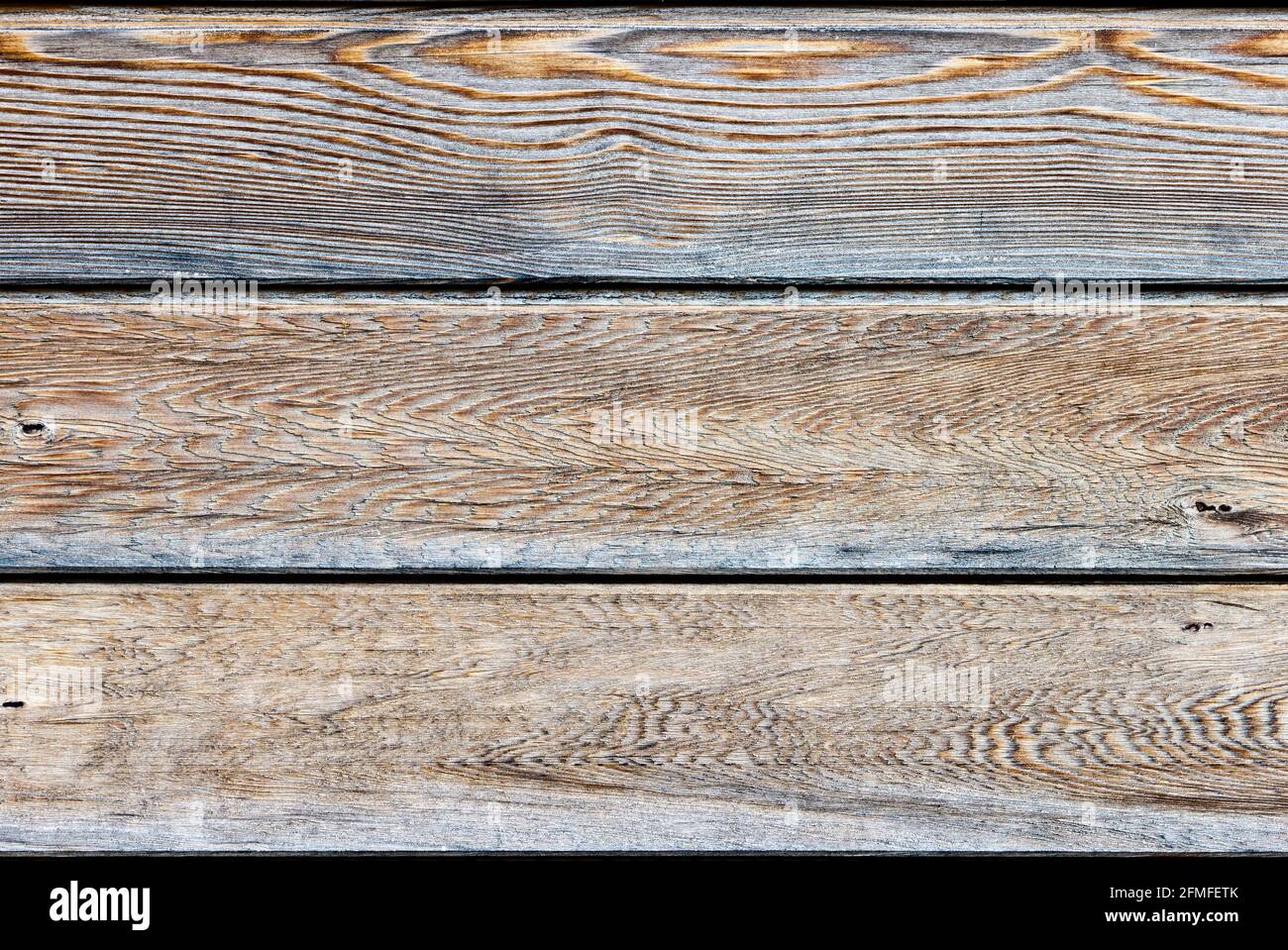 Trois panneaux horizontaux en bois naturel de couleur marron clair Banque D'Images