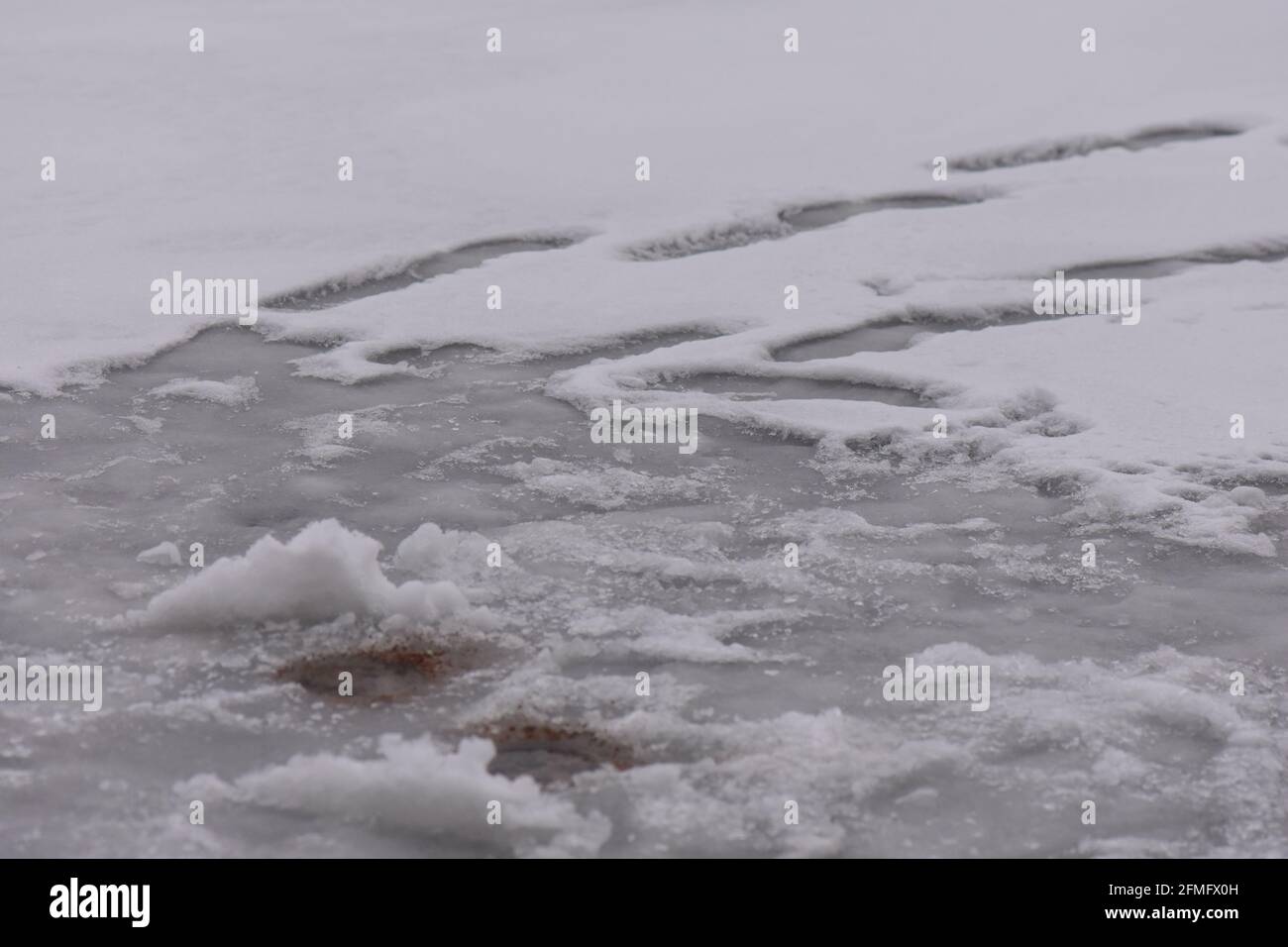 Trou de pêche dans la glace Banque D'Images