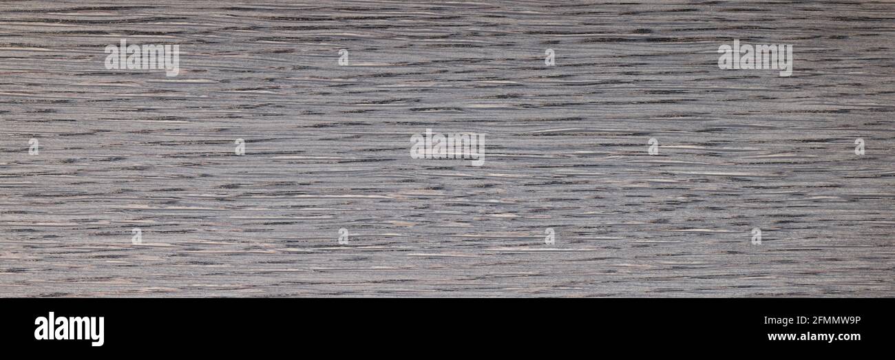 Panneau en bois gris foncé. Revêtements de sol en gros plan Banque D'Images