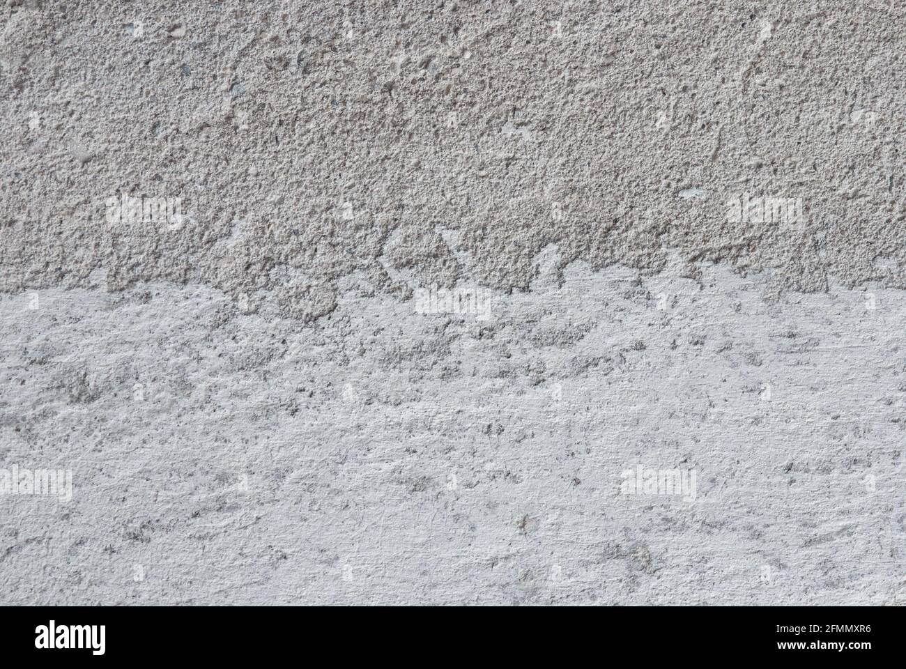 Texture en pierre de béton rugueux gris et blanc pour l'arrière-plan de la photo Banque D'Images