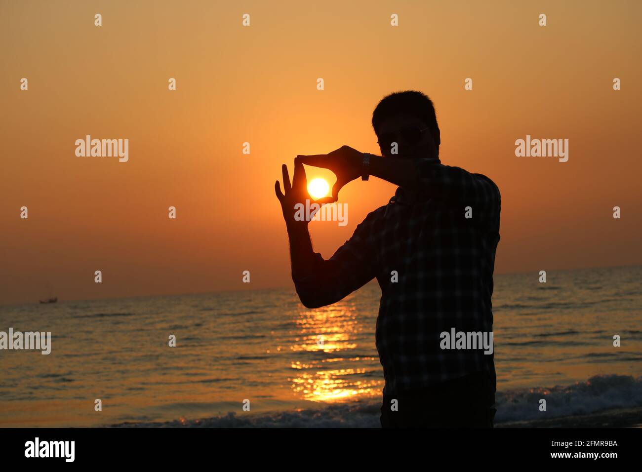 Le beau coucher de soleil à Cox'sbazar Sea Beach, la plus longue plage de la mer au monde Banque D'Images