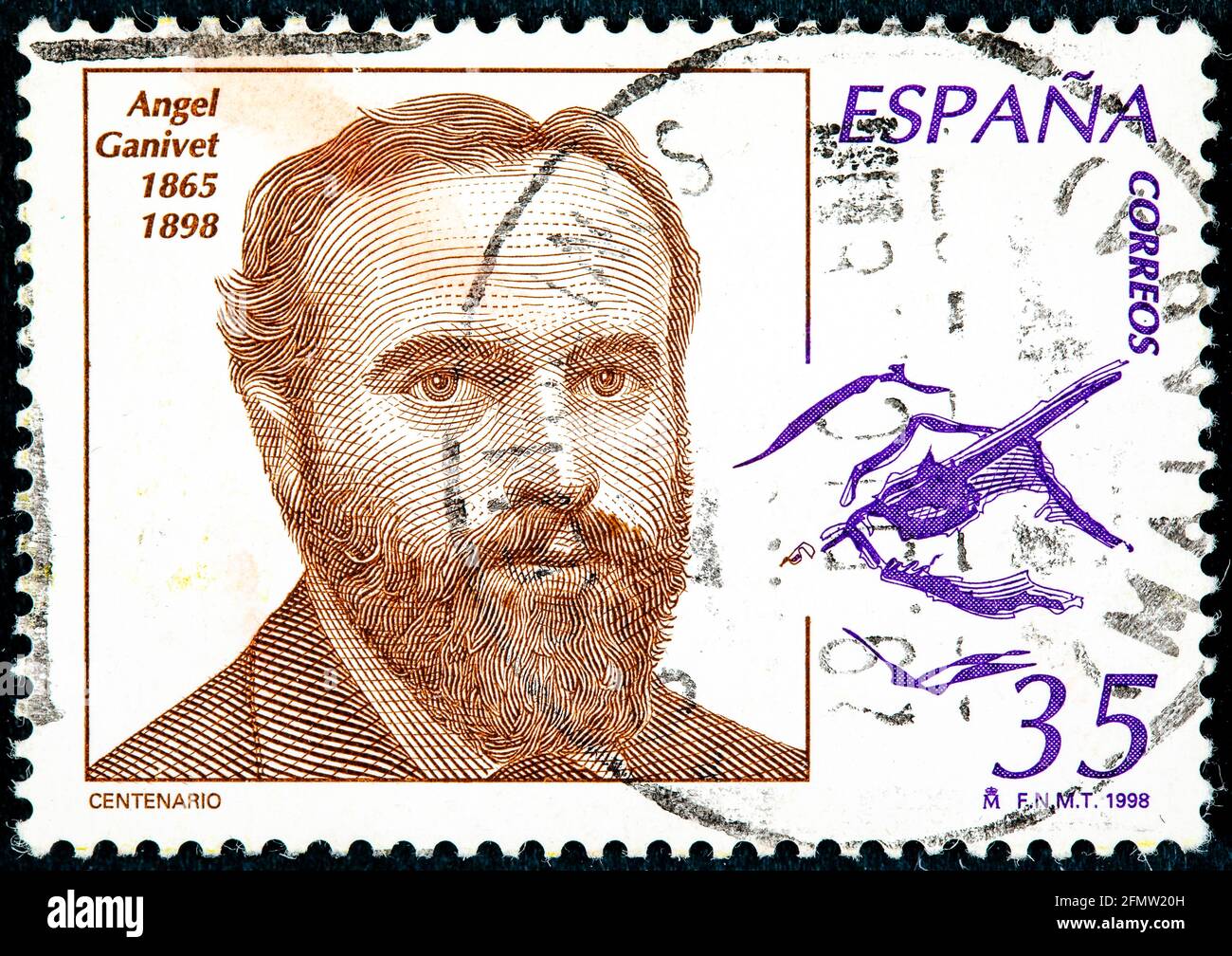 ESPAGNE - VERS 1998: Un timbre imprimé en Espagne montre le visage d'Angel Ganivet, écrivain et diplomate né à Grenade, vers 1998 Banque D'Images