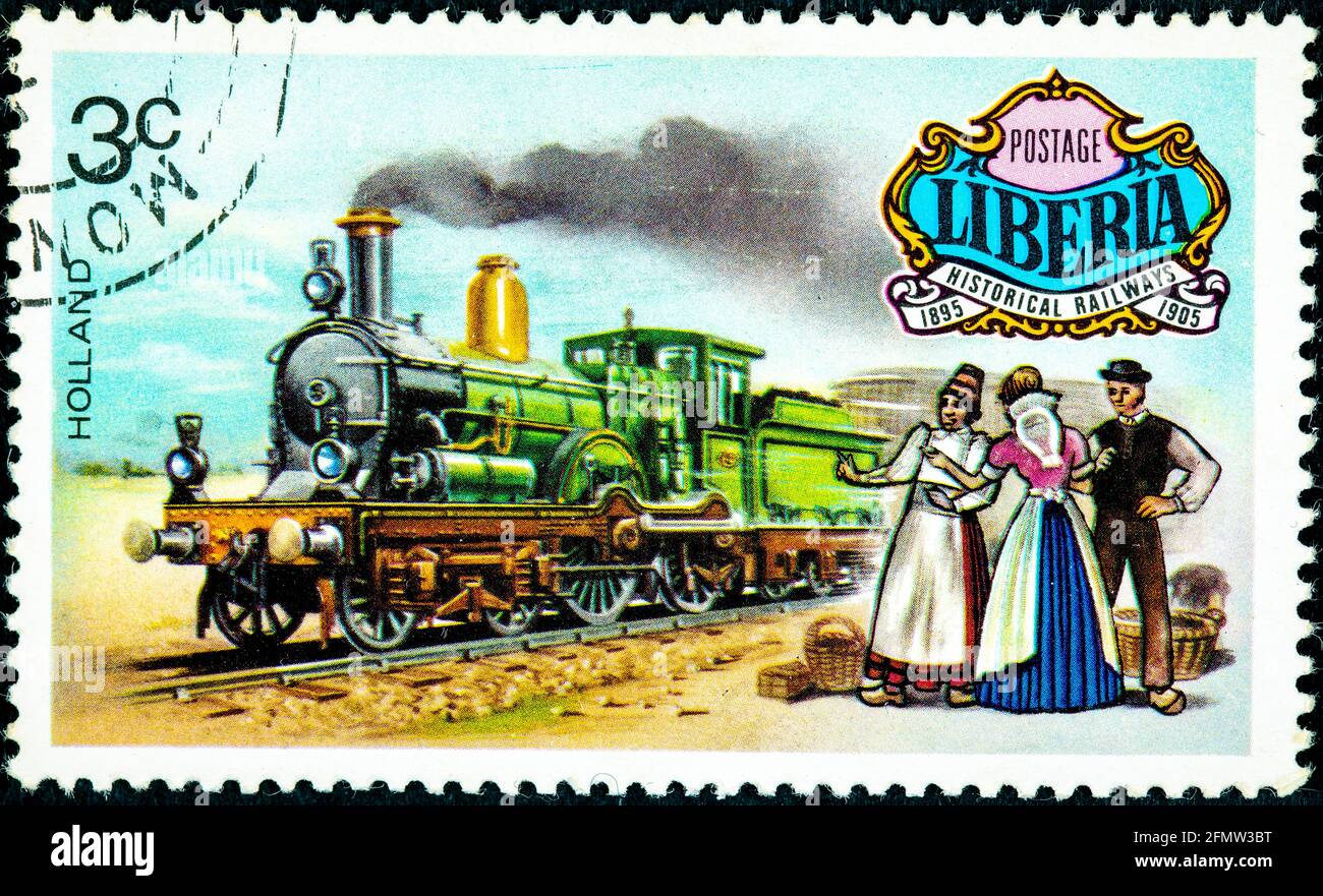 LIBERIA - VERS 1973 : un timbre imprimé au Libéria montre une locomotive historique des pays-Bas vers 1973 Banque D'Images