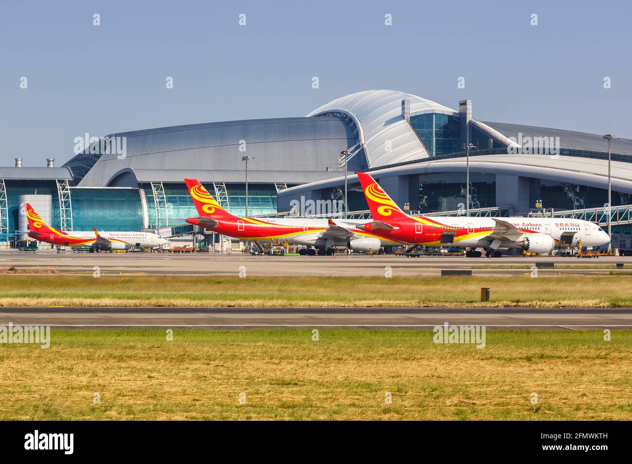 Guangzhou, Chine - 23 septembre 2019 : avions Hainan Airlines à l'aéroport de Guangzhou Baiyun (CAN) en Chine. Banque D'Images