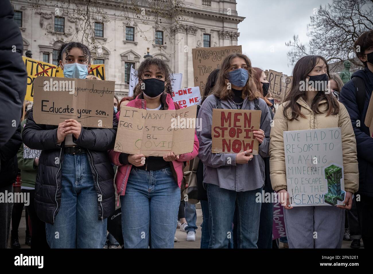 Mettre fin à la violence contre les femmes - le 97 mars à Parliament Square, Londres, Royaume-Uni Banque D'Images