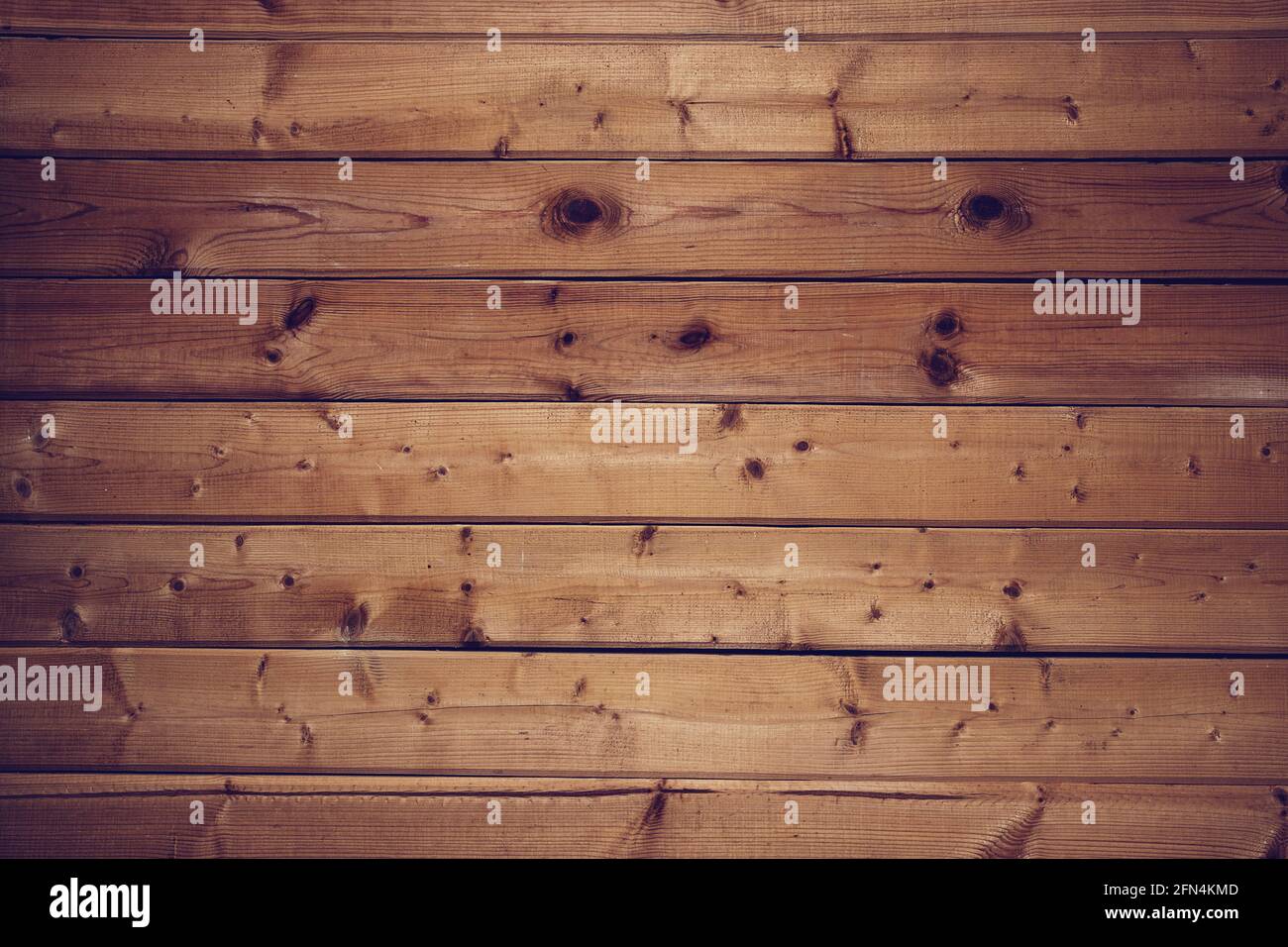 Arrière-plan de texture de bois brun moyen vu d'en haut. Gros plan sur le plancher de table en bois de planche avec texture naturelle. Peut être utilisé comme arrière-plan pour un Banque D'Images