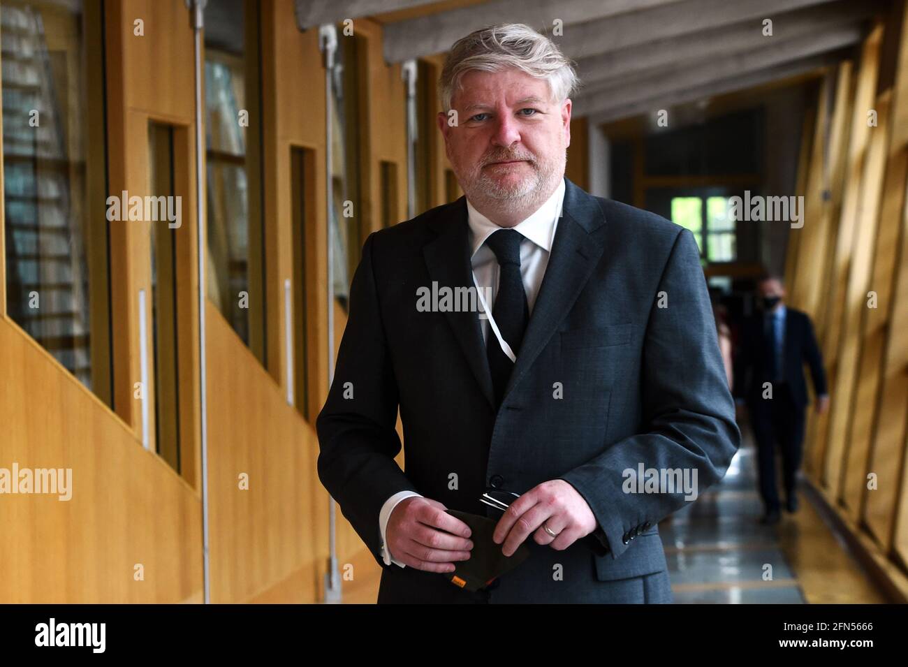 Parti national écossais MSP Angus Robertson arrive pour l'élection du nouveau président adjoint au Parlement écossais à Édimbourg. Date de la photo: Vendredi 14 mai 2021. Banque D'Images