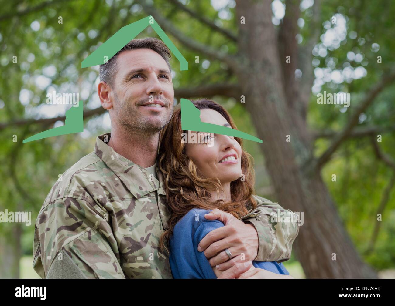 Composition de la maison dessinant sur le portrait d'un soldat masculin souriant avec sa femme Banque D'Images