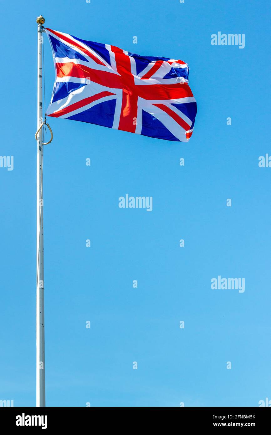 Drapeau Union sur fond bleu ciel Banque D'Images