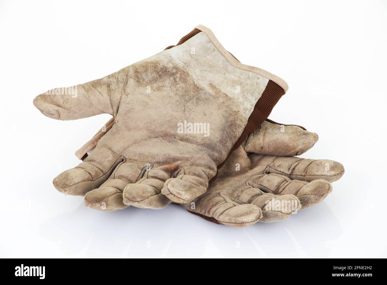 Gants de travail en cuir sur fond blanc A. Banque D'Images