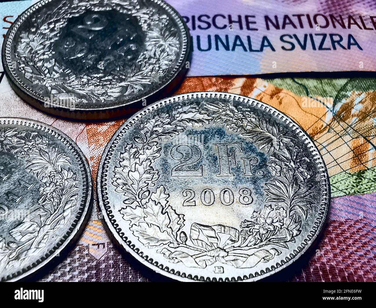 Pièces de monnaie et billets de Francs suisses Banque D'Images