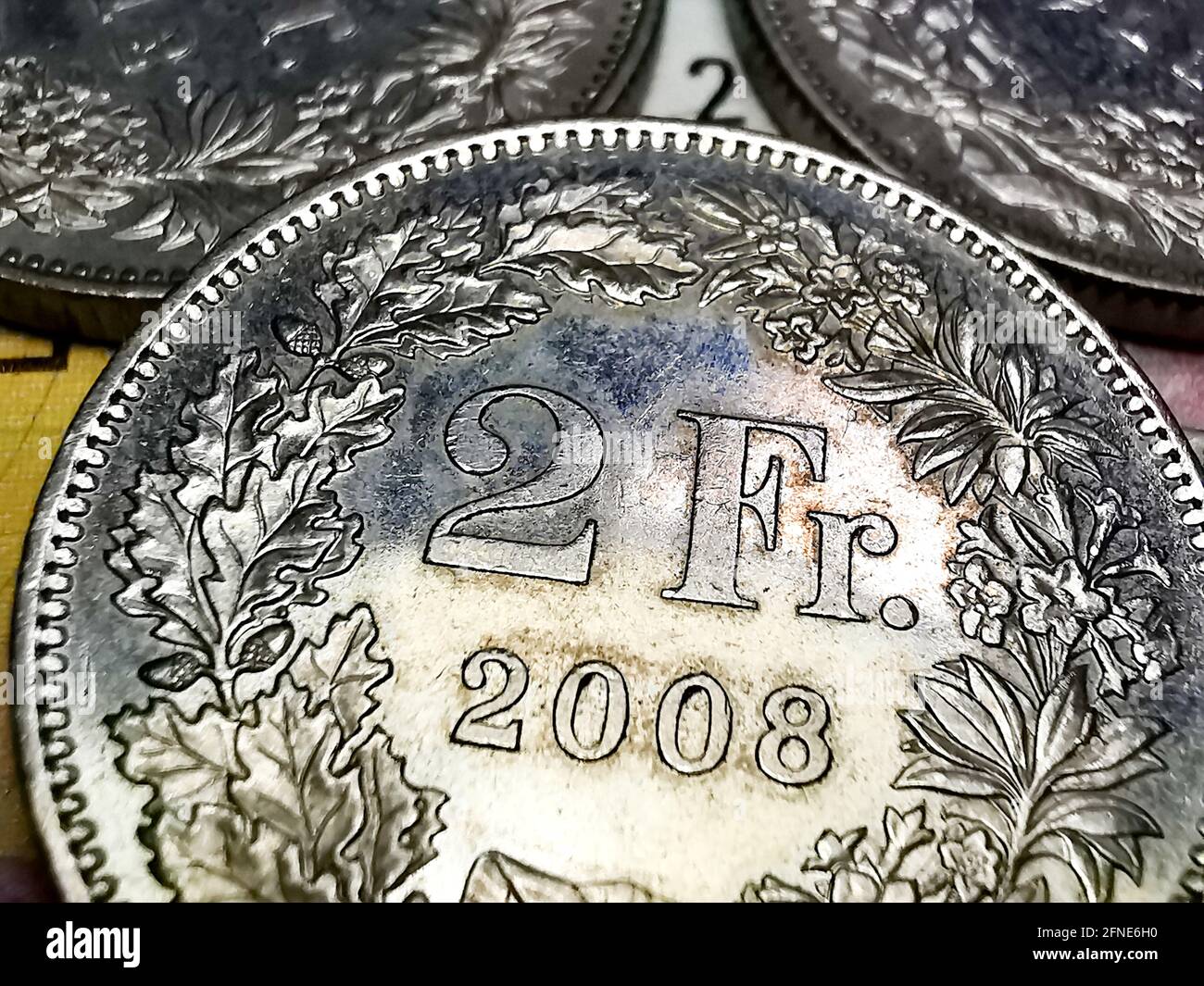 Pièces de monnaie et billets de Francs suisses Banque D'Images