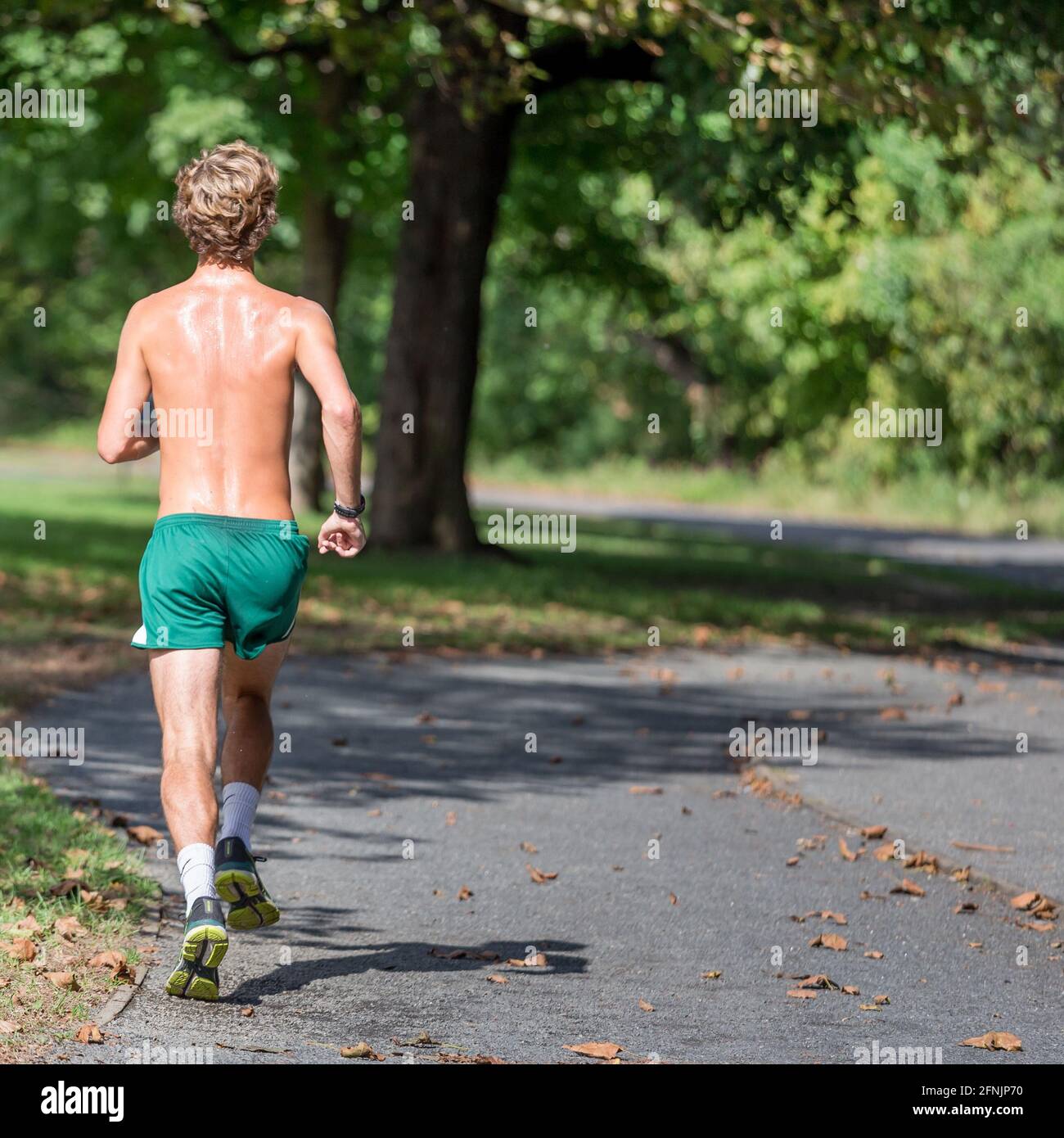 Homme courant dans le parc de New York, États-Unis, routine quotidienne et concept de fitness Banque D'Images