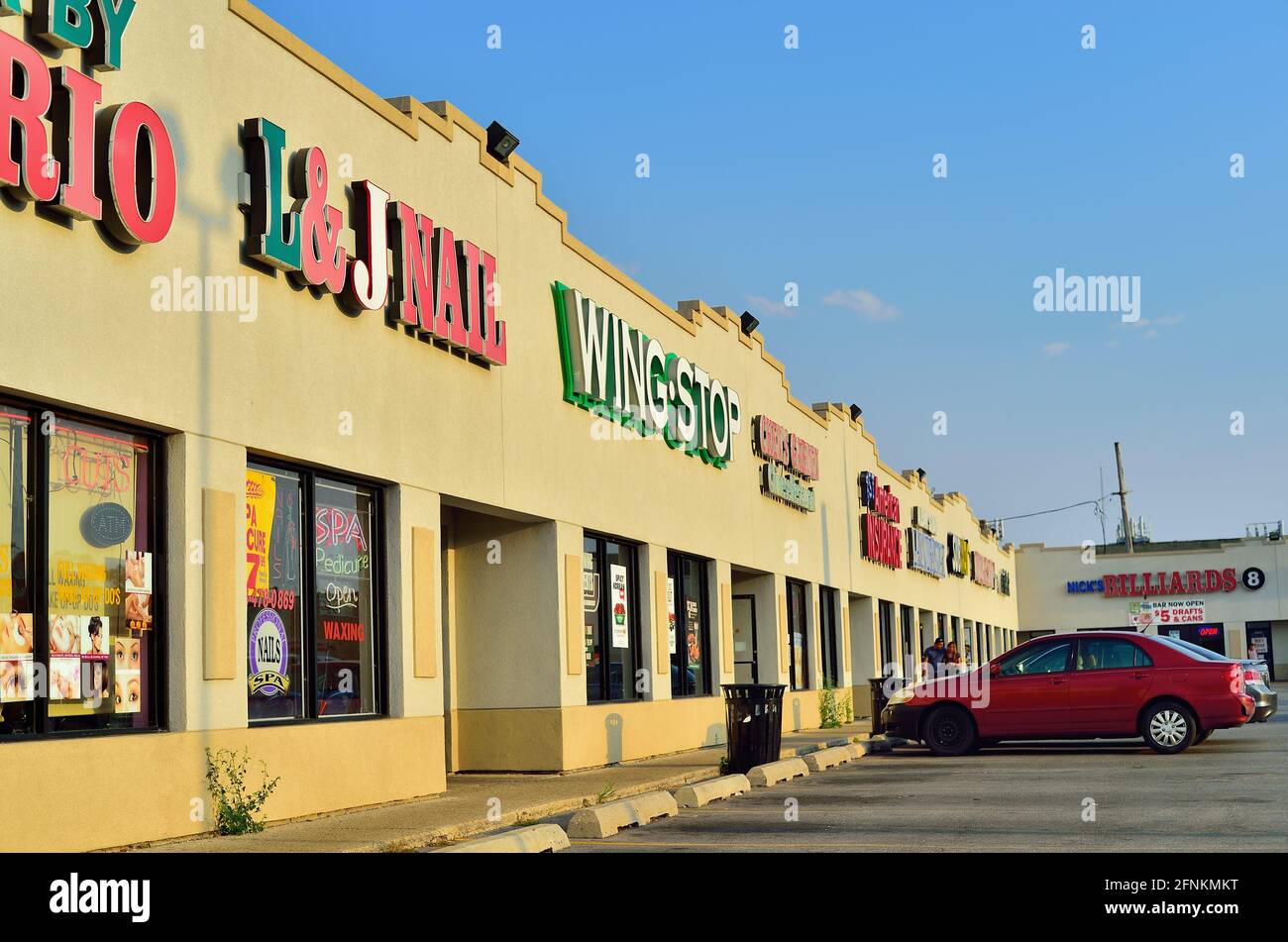 Chicago, Illinois, États-Unis. Étant donné les petits espaces habituellement disponibles dans les grandes zones métropolitaines, les centres commerciaux de bande ont été populaires dans les zones urbaines. Banque D'Images